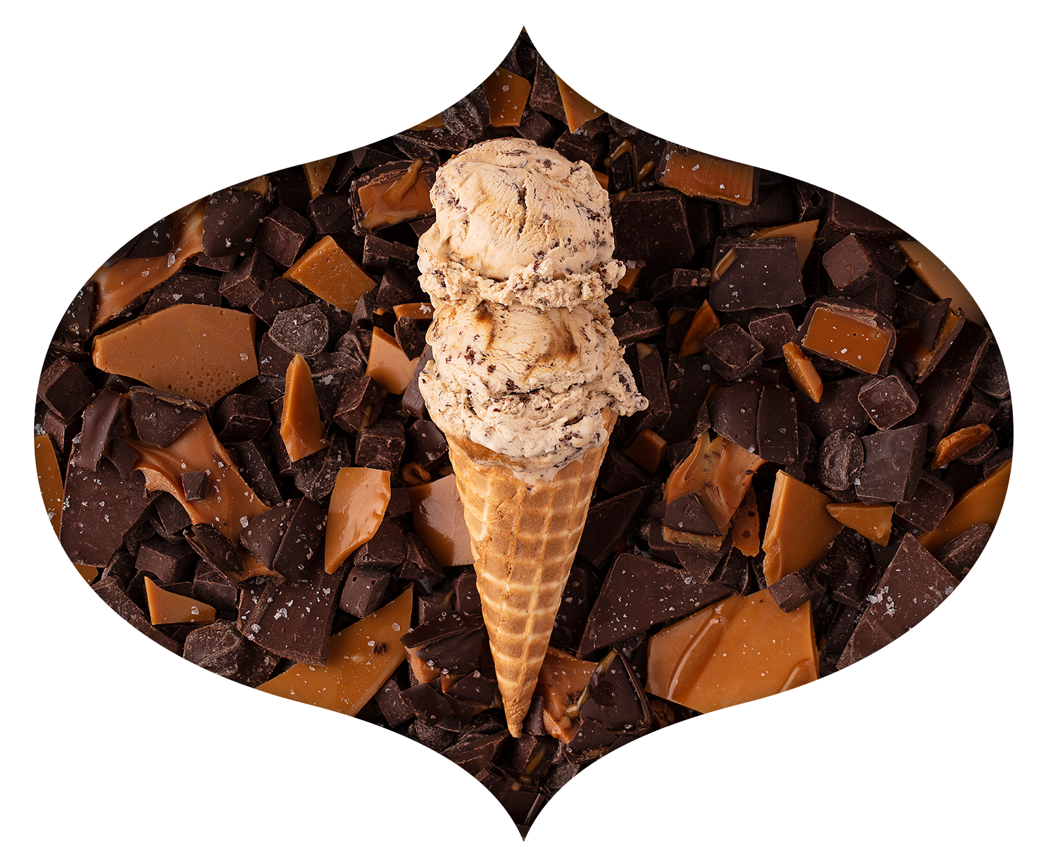 Scoop of Sea Salt Caramel Chocolate in a pile of chocolate shavings