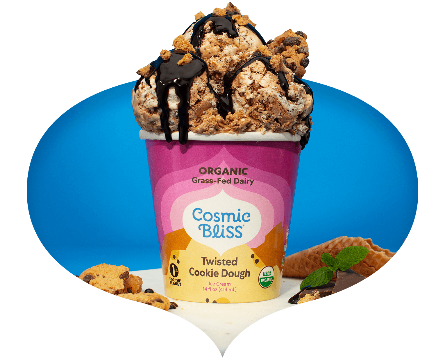 Pint of twisted cookie dough ice cream with 3 scoops on top, chocolate syrup and nuts