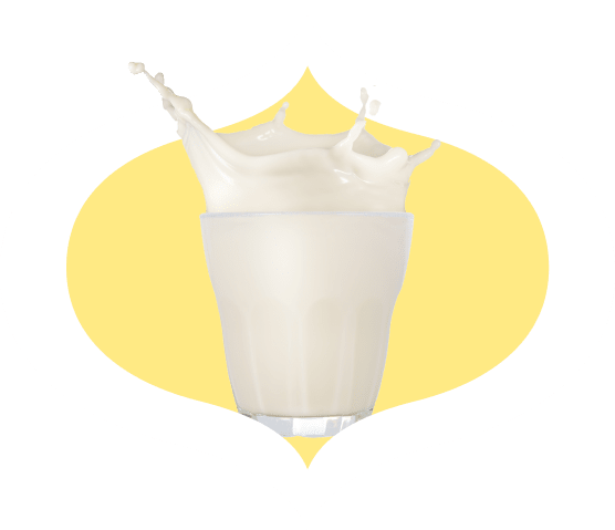A glass of grass-fed milk in a bindi frame